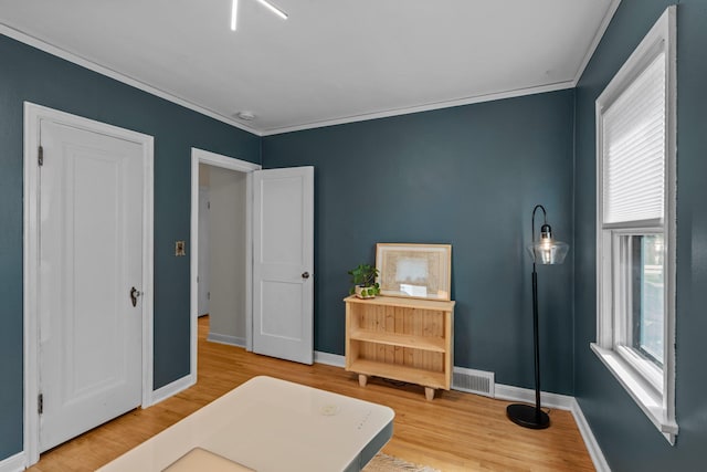 947 Stryker Ave W, Saint Paul, MN 55118 - bedroom featuring wood finished floors and crown molding