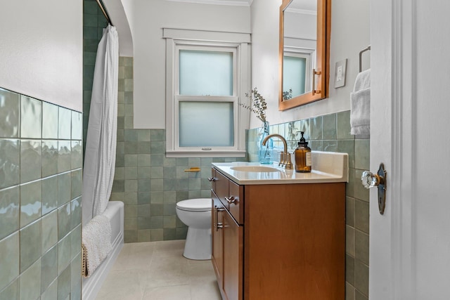 947 Stryker Ave W, Saint Paul, MN 55118 - bathroom featuring tile walls, vanity, tile patterned flooring, shower / bath combo with shower curtain, and wainscoting