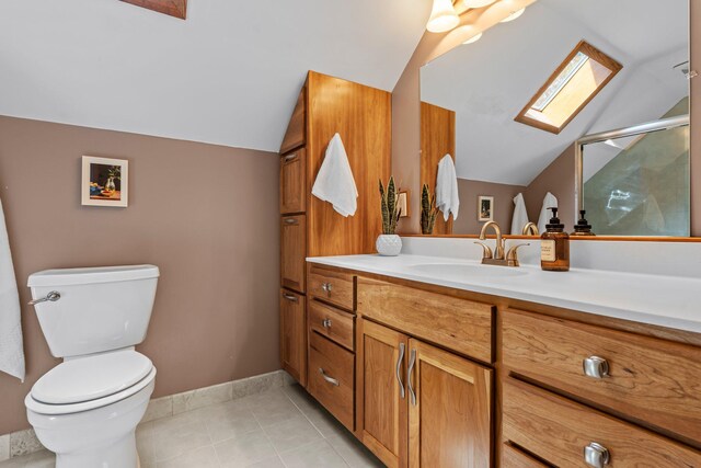 947 Stryker Ave W, Saint Paul, MN 55118 - bathroom with vaulted ceiling, vanity, tile patterned floors, a skylight, and a shower with shower door