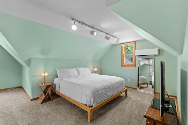 947 Stryker Ave W, Saint Paul, MN 55118 - carpeted bedroom with a wall unit AC, track lighting, and lofted ceiling