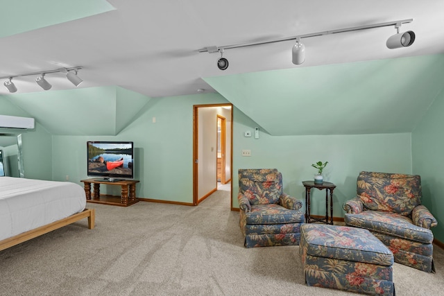 947 Stryker Ave W, Saint Paul, MN 55118 - carpeted bedroom with track lighting, an AC wall unit, and vaulted ceiling
