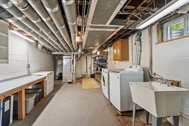 947 Stryker Ave W, Saint Paul, MN 55118 - basement with gas water heater, separate washer and dryer, concrete block wall, refrigerator, and heating unit