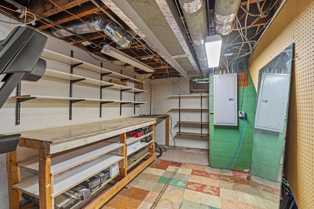 947 Stryker Ave W, Saint Paul, MN 55118 - unfinished basement featuring electric panel, tile patterned floors, and a workshop area