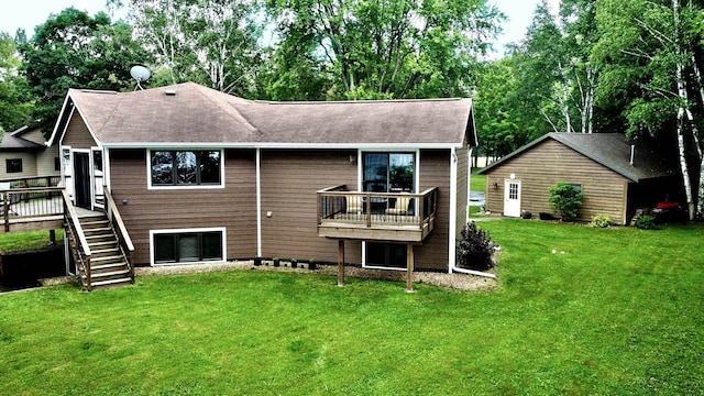 44512 276th Ln, Aitkin, MN 56431 - rear view of house with stairway, a yard, a deck, roof with shingles, and view of wooded area