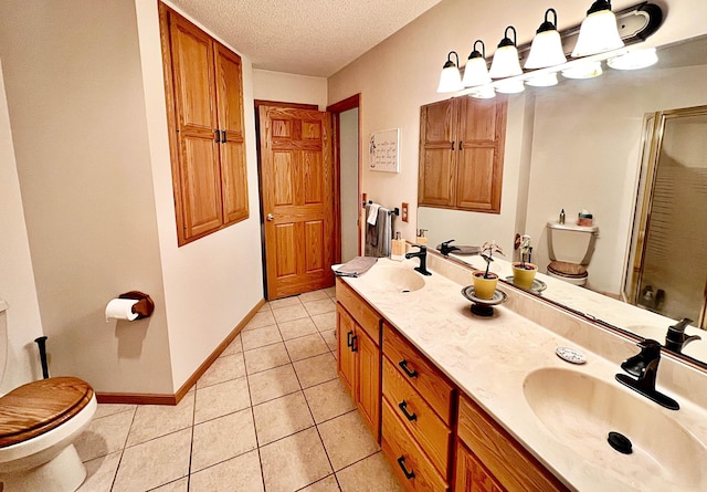 44512 276th Ln, Aitkin, MN 56431 - full bathroom featuring a stall shower, double vanity, a textured ceiling, and tile patterned floors