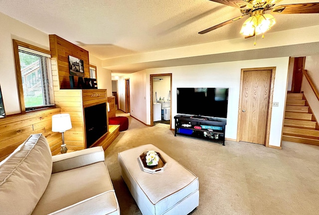 44512 276th Ln, Aitkin, MN 56431 - living area with light colored carpet, stairs, ceiling fan, and a textured ceiling