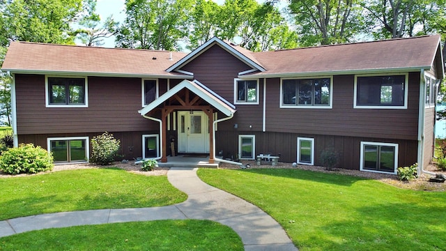 44512 276th Ln, Aitkin, MN 56431 - view of front of home with a front yard and roof with shingles