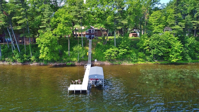 44512 276th Ln, Aitkin, MN 56431 - dock area with a water view and view of wooded area