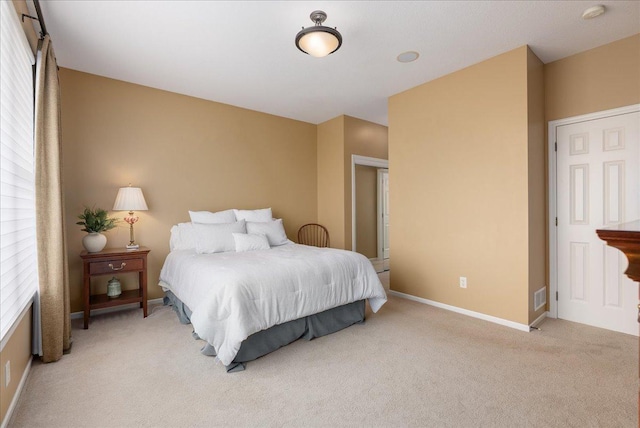 238 Muirfield Trl, Hudson, WI 54016 - bedroom featuring light carpet and multiple windows