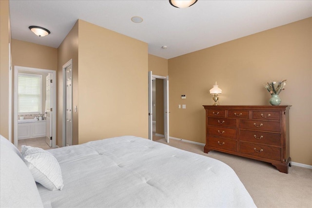 238 Muirfield Trl, Hudson, WI 54016 - bedroom featuring light colored carpet and ensuite bathroom