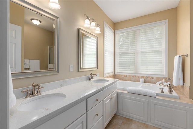 238 Muirfield Trl, Hudson, WI 54016 - bathroom featuring a bath, double vanity, and tile patterned flooring