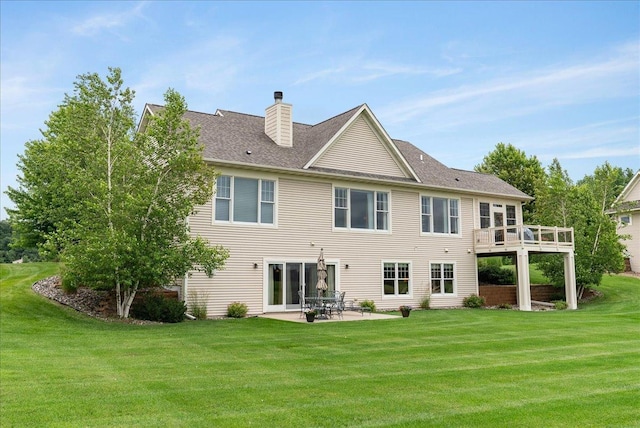 238 Muirfield Trl, Hudson, WI 54016 - back of house with a yard, a chimney, a patio, and a deck