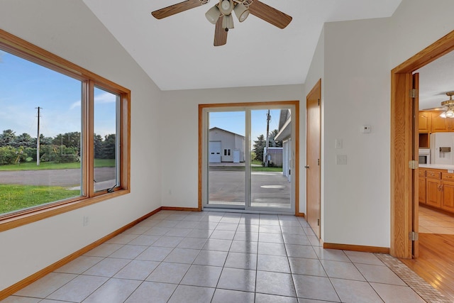 42767 190th Ave, Holding Twp, MN 56340 - empty room featuring ceiling fan, lofted ceiling, and light tile patterned flooring