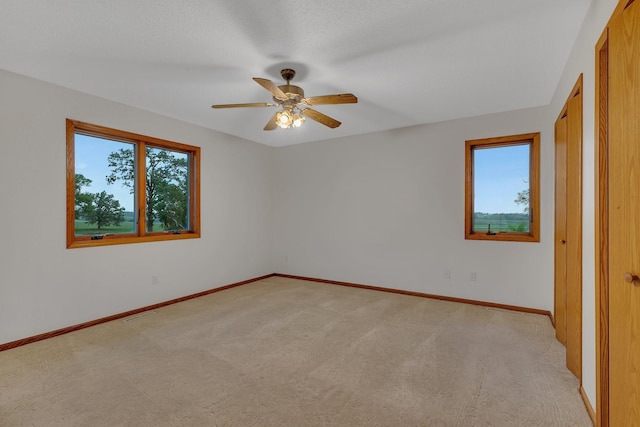42767 190th Ave, Holding Twp, MN 56340 - unfurnished bedroom featuring light colored carpet, ceiling fan, and a closet