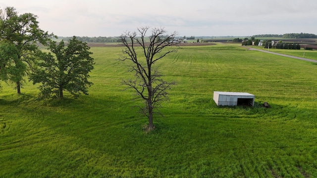 42767 190th Ave, Holding Twp, MN 56340 - view of grassy yard with a view of countryside and an outbuilding
