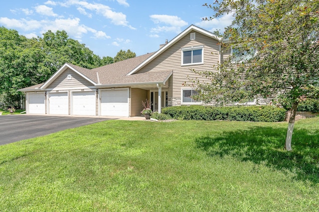 14381 Fairway Dr, Eden Prairie, MN 55344 - view of front facade featuring a garage, driveway, a front lawn, a shingled roof, and a chimney