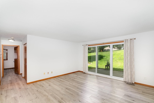 14381 Fairway Dr, Eden Prairie, MN 55344 - spare room featuring light wood-style floors and baseboards