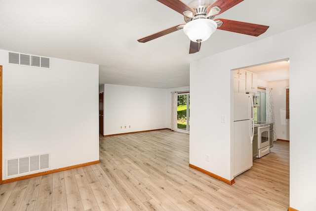 14381 Fairway Dr, Eden Prairie, MN 55344 - unfurnished room with light wood-style floors and ceiling fan