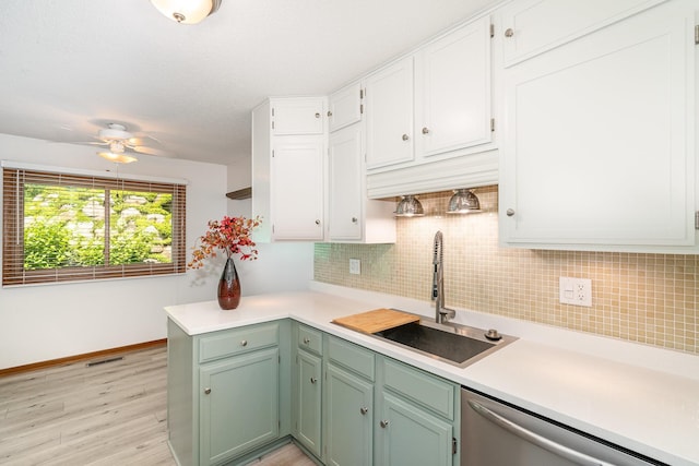 14381 Fairway Dr, Eden Prairie, MN 55344 - kitchen featuring dishwasher, white cabinets, and backsplash