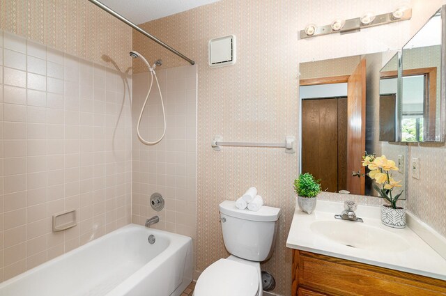 14381 Fairway Dr, Eden Prairie, MN 55344 - full bathroom featuring vanity, shower / tub combination, and wallpapered walls