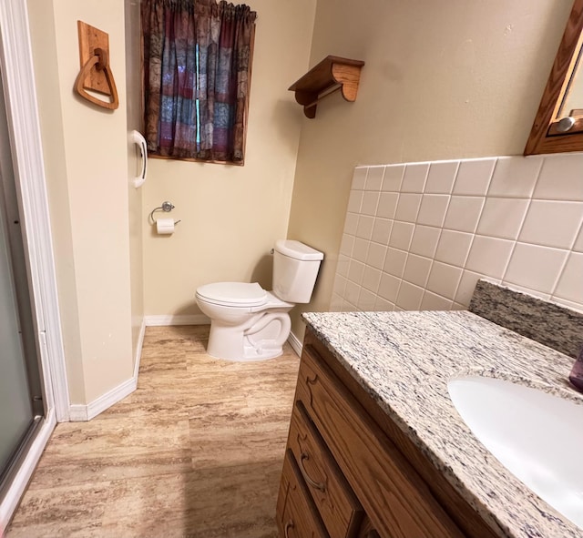 517 2nd St NW, Menahga, MN 56464 - bathroom with wood finished floors and vanity