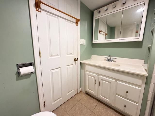 517 2nd St NW, Menahga, MN 56464 - bathroom featuring vanity and tile patterned floors