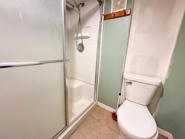 517 2nd St NW, Menahga, MN 56464 - bathroom with a stall shower and tile patterned flooring