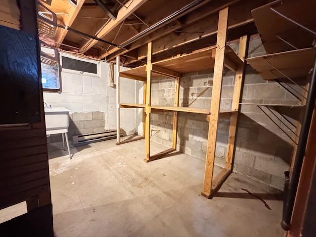 517 2nd St NW, Menahga, MN 56464 - unfinished basement featuring a sink