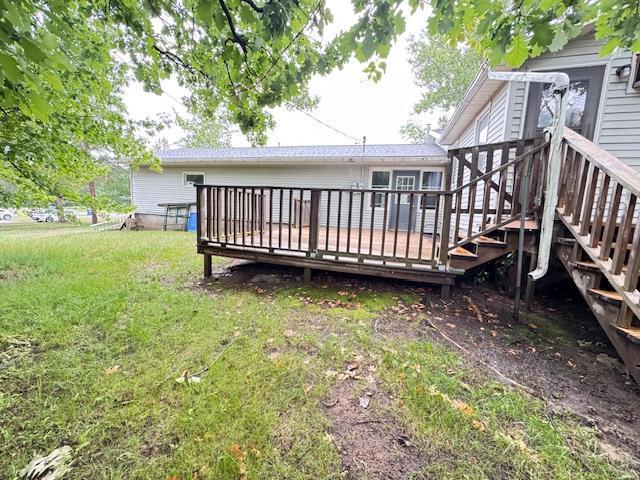 517 2nd St NW, Menahga, MN 56464 - deck with a yard