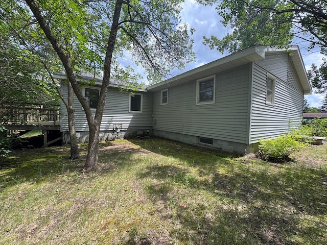 517 2nd St NW, Menahga, MN 56464 - back of house featuring a lawn
