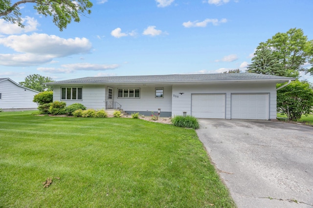 226 Ash Ave, Bird Island, MN 55310 - single story home with an attached garage, a front yard, and concrete driveway