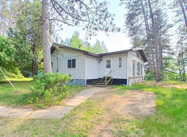 37059 Pinewood Dr, Lawrence Twp, MN 55709 - back of property with entry steps