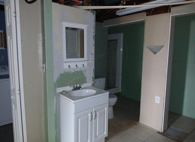 37059 Pinewood Dr, Lawrence Twp, MN 55709 - bathroom featuring tile patterned floors and vanity