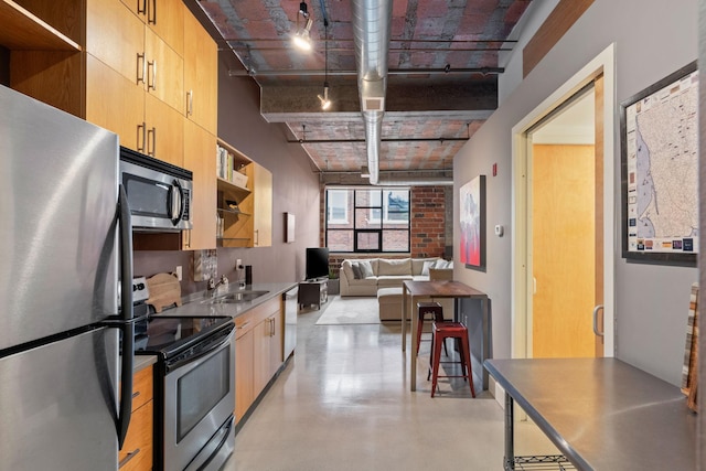 718 Washington Ave N Unit 612, Minneapolis, MN 55401 - kitchen featuring stainless steel appliances, light brown cabinetry, finished concrete floors, and open shelves
