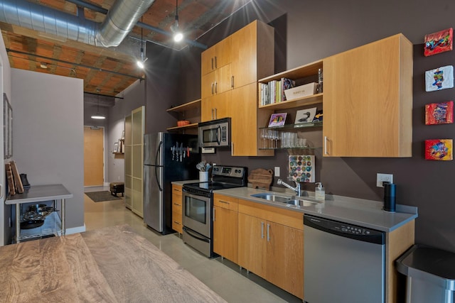 718 Washington Ave N Unit 612, Minneapolis, MN 55401 - kitchen with stainless steel appliances, open shelves, light countertops, and a high ceiling