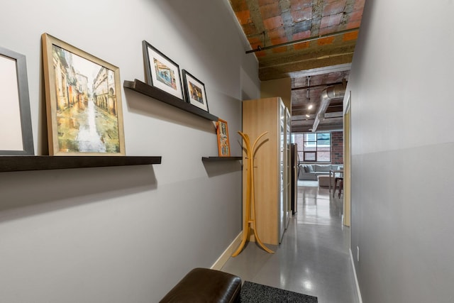 718 Washington Ave N Unit 612, Minneapolis, MN 55401 - hallway with baseboards and finished concrete flooring