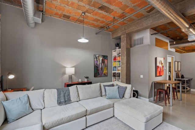 718 Washington Ave N Unit 612, Minneapolis, MN 55401 - living area with a towering ceiling and finished concrete floors