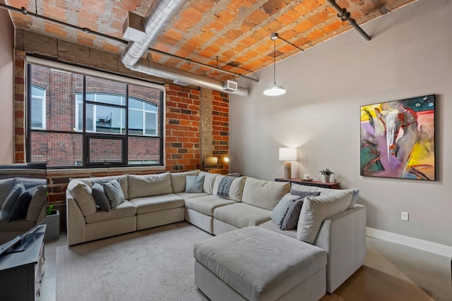 718 Washington Ave N Unit 612, Minneapolis, MN 55401 - living room with brick ceiling and baseboards