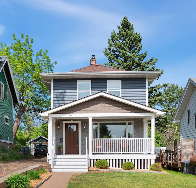 114 Chester Pkwy, Duluth, MN 55805 - traditional style home with covered porch and a chimney