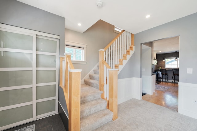 114 Chester Pkwy, Duluth, MN 55805 - staircase with plenty of natural light, carpet flooring, recessed lighting, and wood finished floors