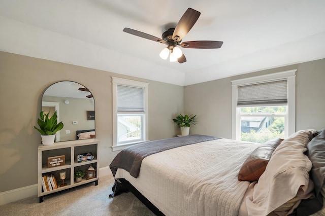 114 Chester Pkwy, Duluth, MN 55805 - bedroom with carpet, multiple windows, and a ceiling fan