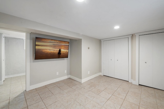 114 Chester Pkwy, Duluth, MN 55805 - unfurnished bedroom featuring two closets and recessed lighting