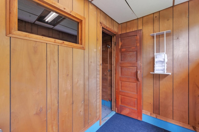 114 Chester Pkwy, Duluth, MN 55805 - hall with carpet flooring and wooden walls