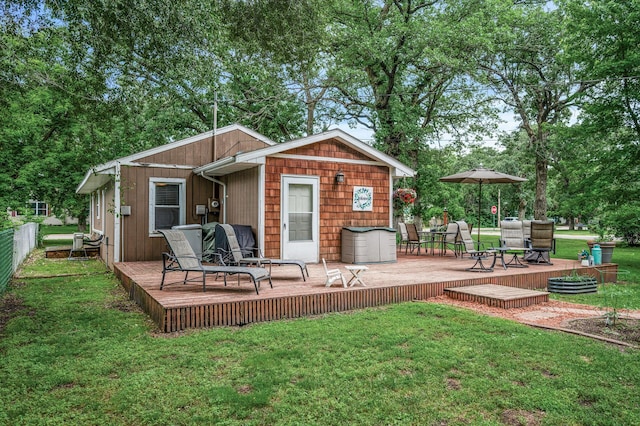 1015 Lake St N, Big Lake, MN 55309 - wooden deck with view of wooded area