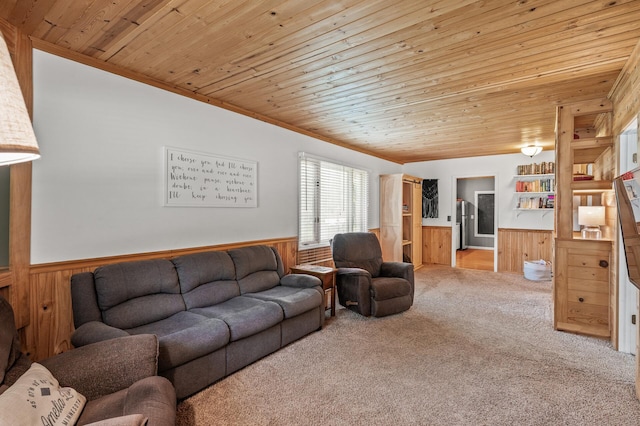 1015 Lake St N, Big Lake, MN 55309 - carpeted living room featuring wainscoting, wooden walls, and wooden ceiling