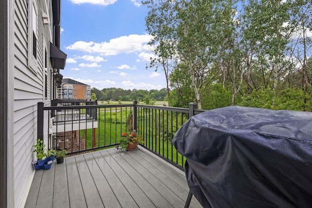 8612 Kenyon Ct NE Unit A, Blaine, MN 55449 - wooden deck featuring a grill