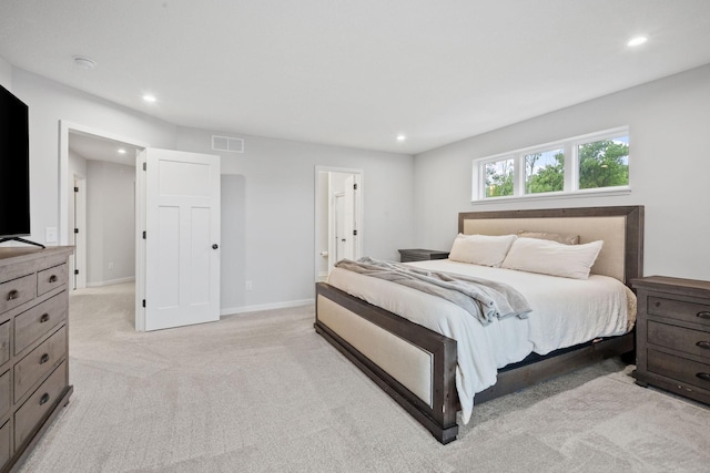 8612 Kenyon Ct NE Unit A, Blaine, MN 55449 - bedroom featuring light carpet, recessed lighting, and ensuite bathroom