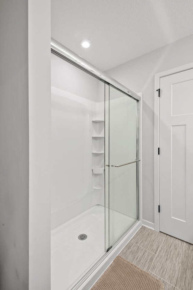 8612 Kenyon Ct NE Unit A, Blaine, MN 55449 - full bath with a shower stall and recessed lighting