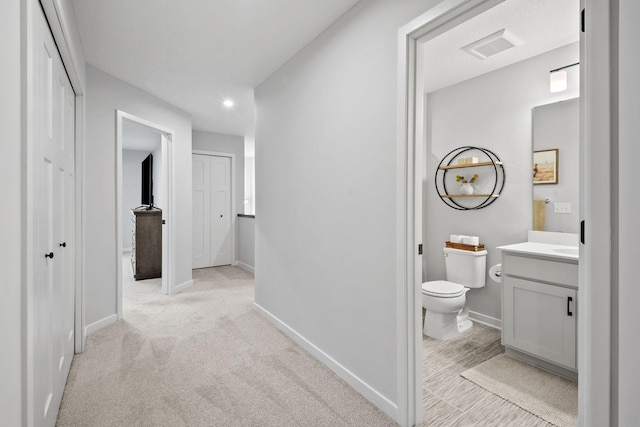 8612 Kenyon Ct NE Unit A, Blaine, MN 55449 - corridor with recessed lighting and light carpet