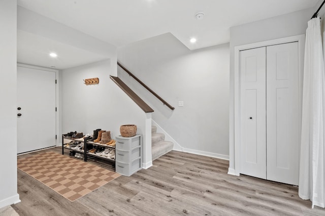 8612 Kenyon Ct NE Unit A, Blaine, MN 55449 - entrance foyer featuring wood finished floors, stairs, and recessed lighting